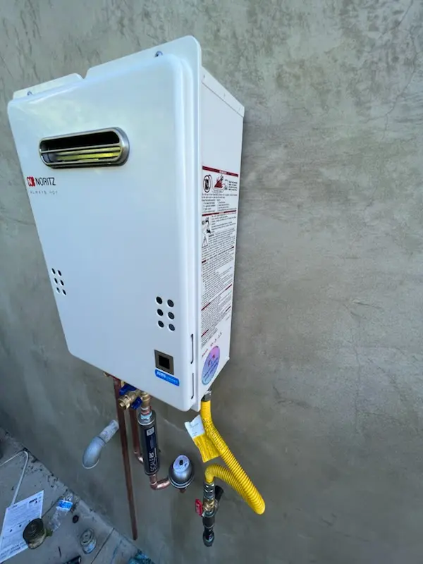 Tankless water heater installation for Bloom Center homes